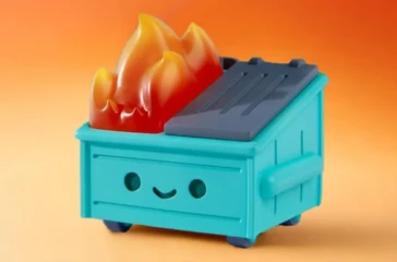Dumpster Fire toy collectible with flames on top against orange background
