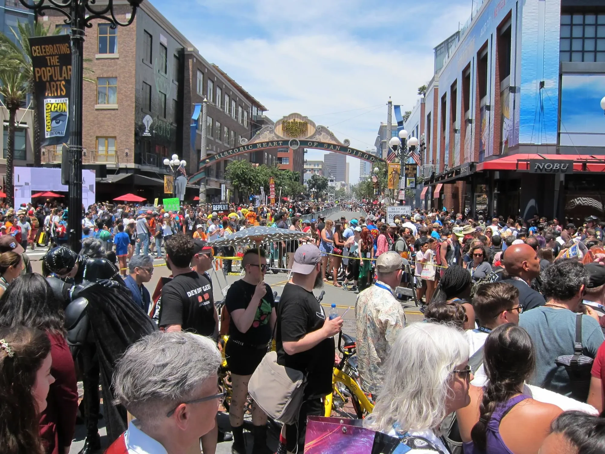 Crowds outside San Diego Comic-Con near the Gaslamp District showing massive convention turnout