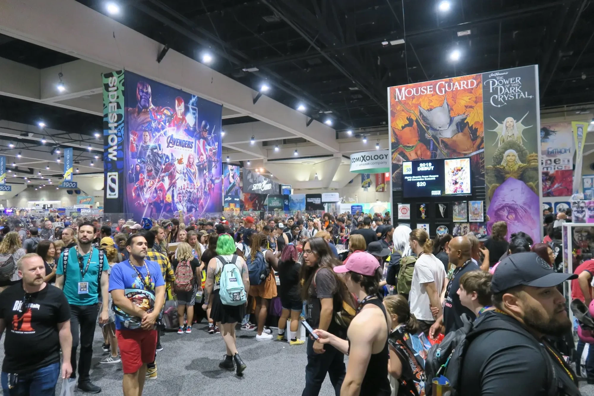 Interior crowd at San Diego Comic-Con showing busy convention floor where small collectibles like the Dumpster Fire toy can stand out