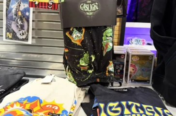Glitch Productions merchandise display featuring animation collectibles and fandom products at a local store