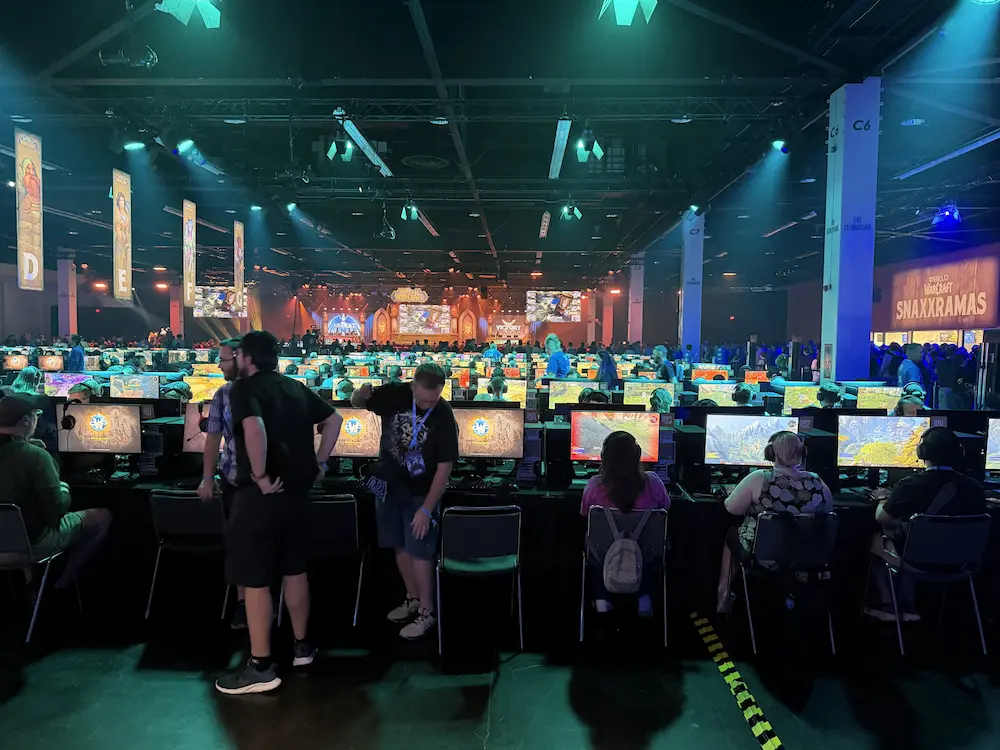 Attendees try out games on rows of demo stations at BlizzCon 2026.